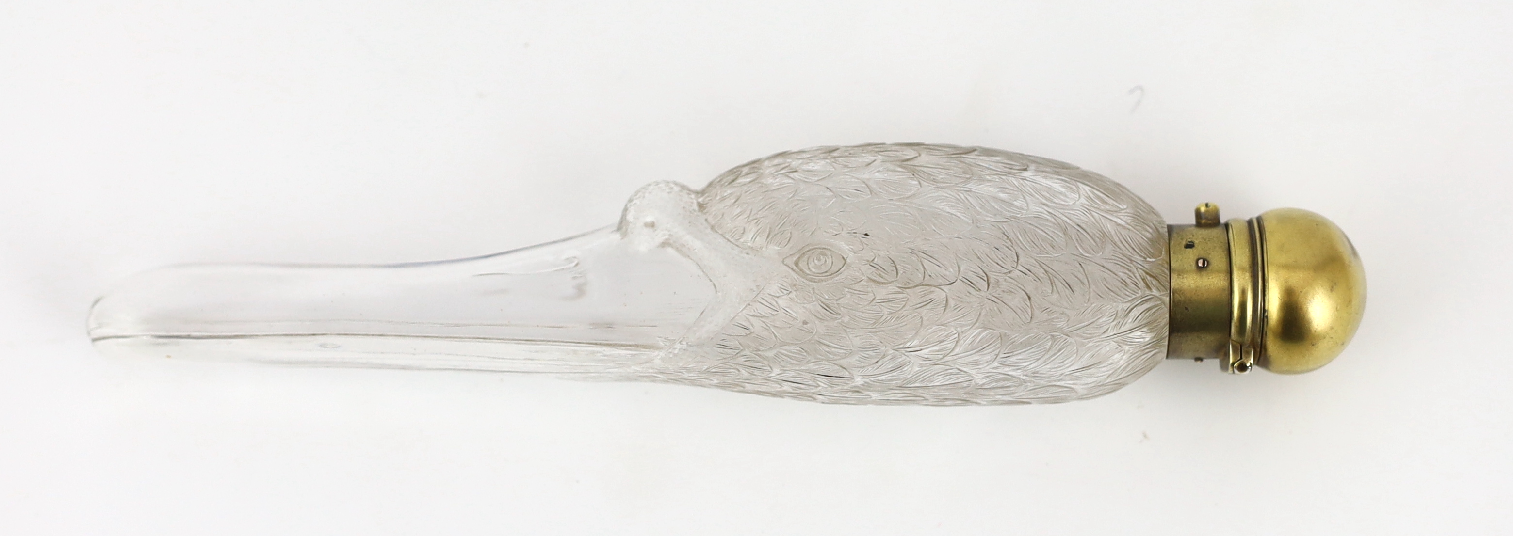 A Victorian silver gilt mounted moulded glass scent bottle, the glass body modelled as the head of a swan, by Walter Thornhill